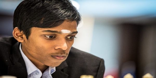 Indian chess prodigy Rameshbabu Praggnanandhaa smiles as his